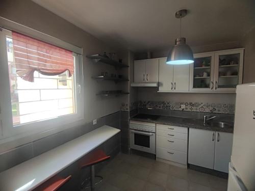 Bel appartement avec piscine in 사이디아 Bel appartement avec piscine in 사이디아
