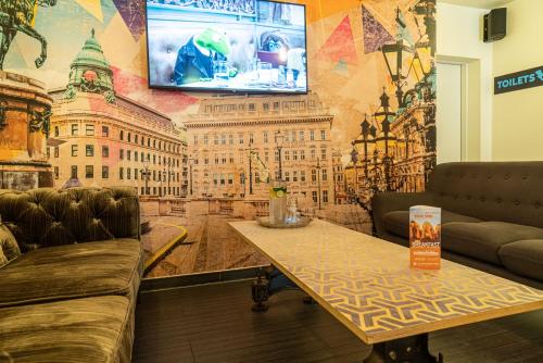 Shared lounge/TV area, St Christopher's Vienna in Vienna Shared lounge/TV area, St Christopher's Vienna in Vienna