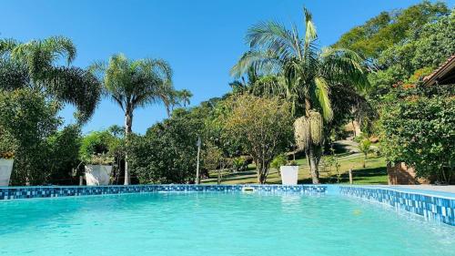 Swimming pool, CASA COM PISCINA EM FLORIPA NORTE DA ILHA 15min Jurere in Florianopolis Swimming pool, CASA COM PISCINA EM FLORIPA NORTE DA ILHA 15min Jurere in Florianopolis