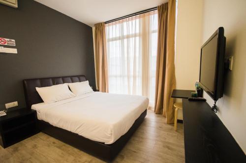 โรงแรมแซนดี้ (Sandy Hotel) in มะละกา เต็งกา โรงแรมแซนดี้ (Sandy Hotel) in มะละกา เต็งกา