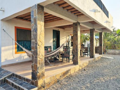 Balcony/terrace, Apartamento frente al mar con jardin privado in Ciénaga Balcony/terrace, Apartamento frente al mar con jardin privado in Ciénaga