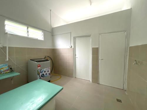 Cosy little home near to the town in Pasir Putih Cosy little home near to the town in Pasir Putih