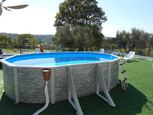 Piscină, La Piccola Masseria in Cisternino Piscină, La Piccola Masseria in Cisternino