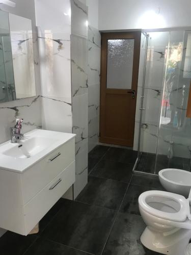 Banheiro, Borsh Beach Apartments - BBA in Qazim Pali Banheiro, Borsh Beach Apartments - BBA in Qazim Pali