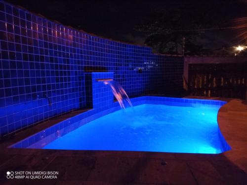 Casa com piscina , churrasqueira, Wi-Fi, em rua de Areia a 1km da praia, bairro sussegado, proibido in 雅尔丁达斯帕尔梅拉斯 Casa com piscina , churrasqueira, Wi-Fi, em rua de Areia a 1km da praia, bairro sussegado, proibido in 雅尔丁达斯帕尔梅拉斯