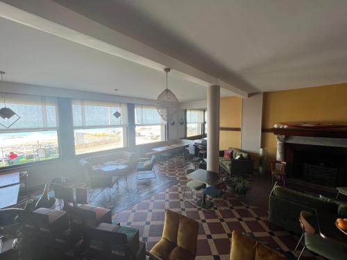 Bar/lounge, Boutique Hotel La Maison des Galets sur le front de mer in Saint-Valery-en-Caux Bar/lounge, Boutique Hotel La Maison des Galets sur le front de mer in Saint-Valery-en-Caux