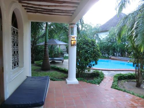 Schwimmbad, Villa Lamuhouse Diani Beach in Mombasa Schwimmbad, Villa Lamuhouse Diani Beach in Mombasa