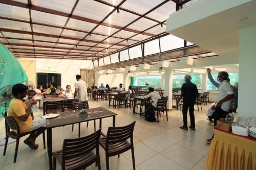 Restaurant, Orange Orchid - 6BHK Private Pool Villa in Kilpettai Restaurant, Orange Orchid - 6BHK Private Pool Villa in Kilpettai