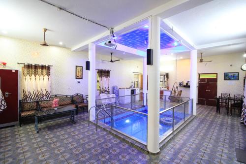 Swimming pool, Orange Orchid - 6BHK Private Pool Villa in Kilpettai Swimming pool, Orange Orchid - 6BHK Private Pool Villa in Kilpettai