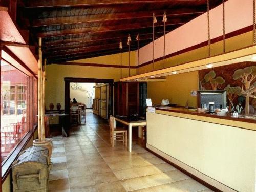 Vestíbulo, Passaros Suite Hotel in Puerto Iguazú Vestíbulo, Passaros Suite Hotel in Puerto Iguazú