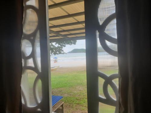 Garden, Tupi's Beachfront Home 2BR near Nagtabon Beach Garden, Tupi's Beachfront Home 2BR near Nagtabon Beach