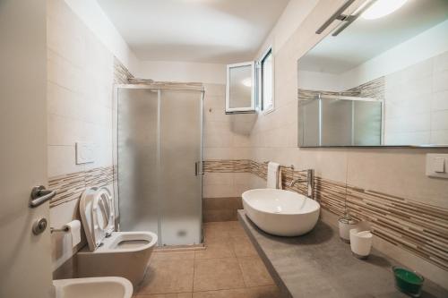 Bathroom, G-room in Pulsano Bathroom, G-room in Pulsano