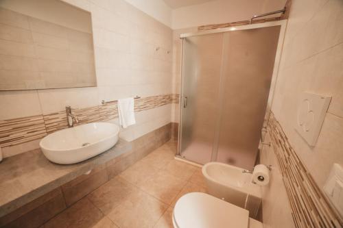 Bathroom, G-room in Pulsano Bathroom, G-room in Pulsano