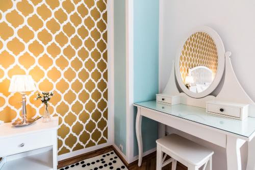 Golden Esthetic with Red Sofa Apartment