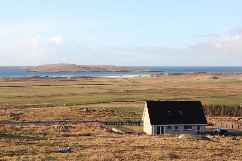 Exterior view, Clachan Sands Cottage in Beinn na Foghla agus Uibhist a Tuath Exterior view, Clachan Sands Cottage in Beinn na Foghla agus Uibhist a Tuath
