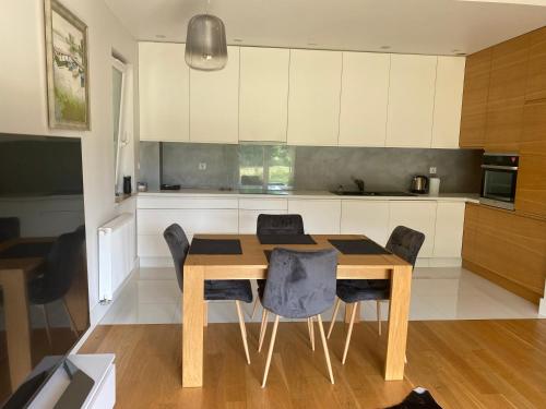 Apartament Myśliwska z ogródkiem (Apartament Mysliwska z ogrodkiem) in Piecki-Migowo Apartament Myśliwska z ogródkiem (Apartament Mysliwska z ogrodkiem) in Piecki-Migowo