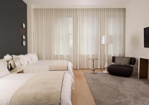 This photo about Ames Boston Hotel, Curio Collection by Hilton shared on HyHotel.com