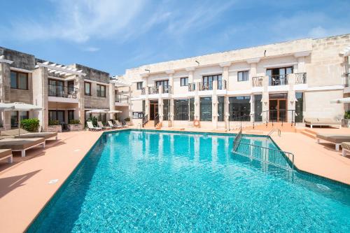 Piscina, Menorca Binibeca by Pierre & Vacances Premium Adults Only in Menorca Piscina, Menorca Binibeca by Pierre & Vacances Premium Adults Only in Menorca
