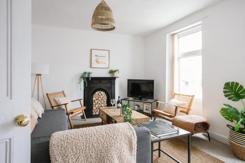 sala de TV, Cosy period cottage 2min walk to the beach in Portrush sala de TV, Cosy period cottage 2min walk to the beach in Portrush