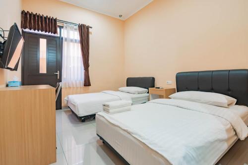 Shofy Guest House Syariah Mitra RedDoorz in Soekarno Hatta Bypass Shofy Guest House Syariah Mitra RedDoorz in Soekarno Hatta Bypass