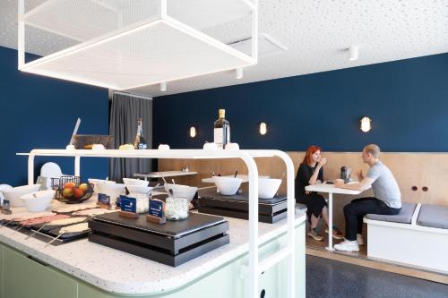 Comida y bebida, MEININGER Hotel Bremen Hauptbahnhof in Bremen Comida y bebida, MEININGER Hotel Bremen Hauptbahnhof in Bremen