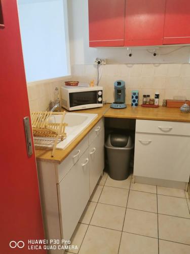 Kitchen, Appartement cosy et lumineux in District 04 Kitchen, Appartement cosy et lumineux in District 04