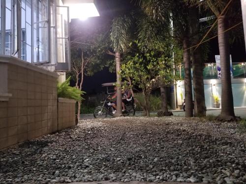 Garden, Casita Mia - Guest House for 9pax with WIFI, NETFLIX, YOUTUBE, KARAOKE, CAN COOK and BBQ in Malolos Garden, Casita Mia - Guest House for 9pax with WIFI, NETFLIX, YOUTUBE, KARAOKE, CAN COOK and BBQ in Malolos