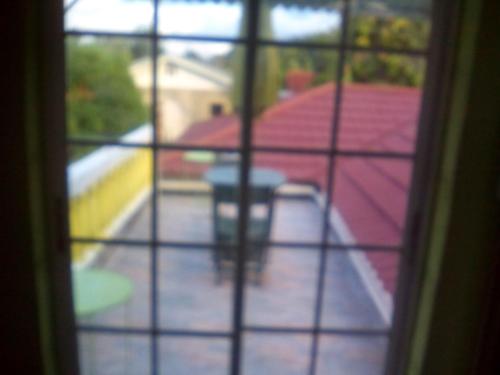Balkon/terasa, Buckingham Villa - Full Suite Kitchenette-Wet Bar- Balcony in Silver Hill Balkon/terasa, Buckingham Villa - Full Suite Kitchenette-Wet Bar- Balcony in Silver Hill