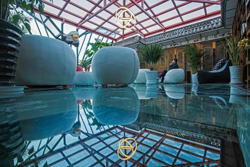 Shared lounge/TV area, China Old Story Inns Dali Ancient Town in Dali Shared lounge/TV area, China Old Story Inns Dali Ancient Town in Dali