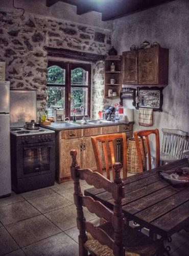 Dorotheas Stone house in the forest in Sklithron Dorotheas Stone house in the forest in Sklithron