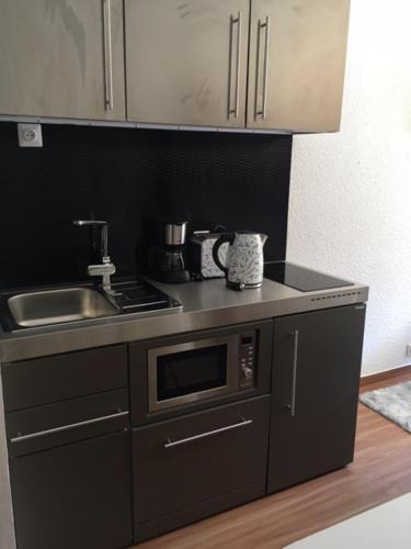 Kitchen, studio cabine chalet club III entierement renove in Tignes Kitchen, studio cabine chalet club III entierement renove in Tignes