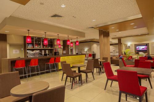 Паб/Коктейль-бар, Heliconia Park Port Harcourt Hotel and Suites in порт Харкорт Паб/Коктейль-бар, Heliconia Park Port Harcourt Hotel and Suites in порт Харкорт