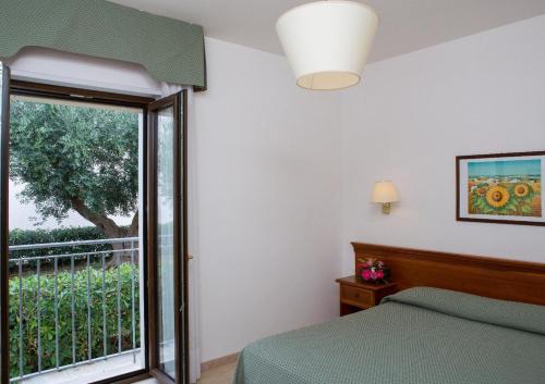Guestroom, Hotel Ramapendula in Alberobello Guestroom, Hotel Ramapendula in Alberobello