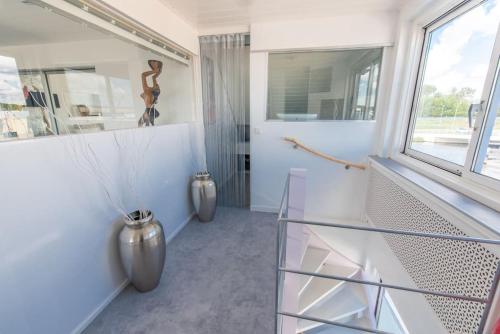 The Waterside Designer Waterfront Oasis Spa & Sauna Terrace in Zwanenburg The Waterside Designer Waterfront Oasis Spa & Sauna Terrace in Zwanenburg