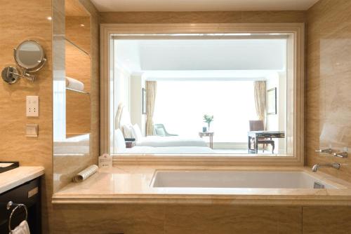 Qingdao Jinshi International Hotel in Ціндао Qingdao Jinshi International Hotel in Ціндао