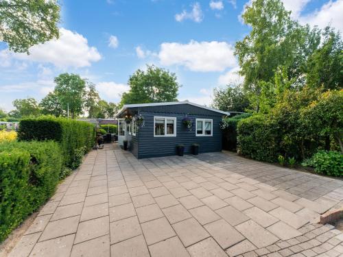 Exterior view, Lovely Wooden Chalet with garden in Reutum Twente in Reutum Exterior view, Lovely Wooden Chalet with garden in Reutum Twente in Reutum