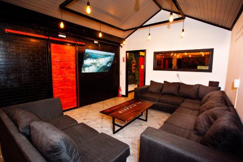 Shared lounge/TV area, El Refugio Lodge Hostel in Ushuaia Shared lounge/TV area, El Refugio Lodge Hostel in Ushuaia