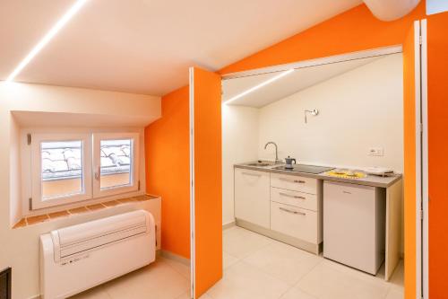 Kitchen, San Francesco Modern and Central Apartments in Pisa Kitchen, San Francesco Modern and Central Apartments in Pisa