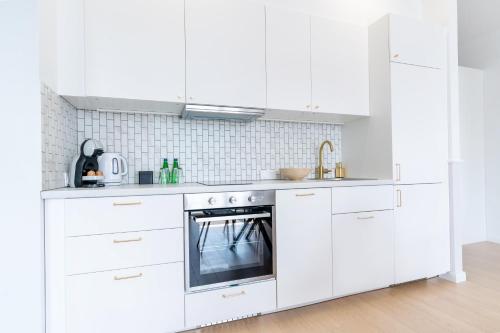 ห้องครัว, Apartament Superior 2 sypialnie przy Jeziorze Ukiel Olsztyn Plaża Miejska (Apartament Superior 2 sypialnie przy Jeziorze Ukiel Olsztyn Plaza Miejska) in โอลสทีน ห้องครัว, Apartament Superior 2 sypialnie przy Jeziorze Ukiel Olsztyn Plaża Miejska (Apartament Superior 2 sypialnie przy Jeziorze Ukiel Olsztyn Plaza Miejska) in โอลสทีน