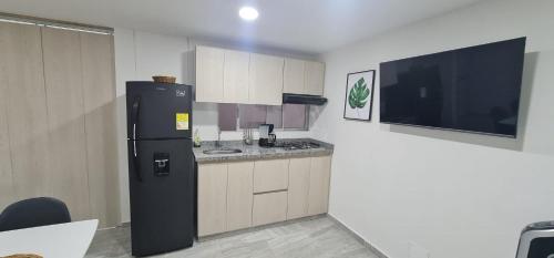Kitchen, Hermoso Apartamento Entero - Parqueadero - Ibague - Roble near Centro Comercial Multicentro Ibague Kitchen, Hermoso Apartamento Entero - Parqueadero - Ibague - Roble near Centro Comercial Multicentro Ibague