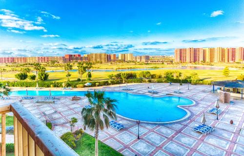 Swimming pool, Golf Porto Marina Hotel Apartments by Amer Group in El Alamein Swimming pool, Golf Porto Marina Hotel Apartments by Amer Group in El Alamein