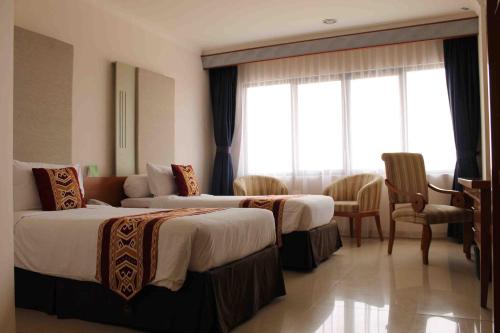 This photo about Asana Kawanua shared on HyHotel.com