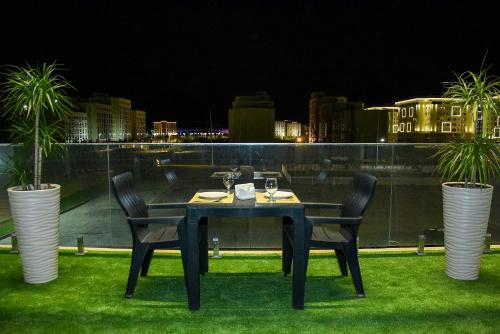 Балкон/тераса, Ramada by Wyndham Turkistan in Turkistan Балкон/тераса, Ramada by Wyndham Turkistan in Turkistan