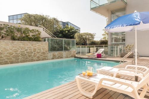 Swimming pool, Appart'City Classic Antibes in Antibes Swimming pool, Appart'City Classic Antibes in Antibes