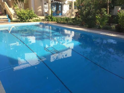 Blue villa with large private pool in Abu Talat in ADH Dheraa Al Bahri Blue villa with large private pool in Abu Talat in ADH Dheraa Al Bahri