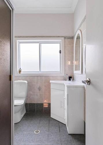 Bathroom, HARBOUR-FRONT CHARM // STOCKTON NSW in Stockton Bathroom, HARBOUR-FRONT CHARM // STOCKTON NSW in Stockton