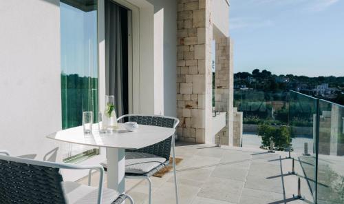 Balcony/terrace, Essenza Relais Contemporaneo in Cisternino Balcony/terrace, Essenza Relais Contemporaneo in Cisternino