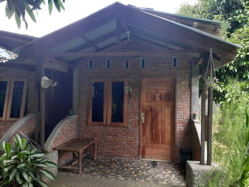 Kert, Jhony's Backpacker-Guest House in Bukit Lawang Kert, Jhony's Backpacker-Guest House in Bukit Lawang