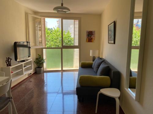 sala de TV, Luminoso apartamento en Canet de Mar cercano a la playa y a Barcelona in Canet De Mar sala de TV, Luminoso apartamento en Canet de Mar cercano a la playa y a Barcelona in Canet De Mar