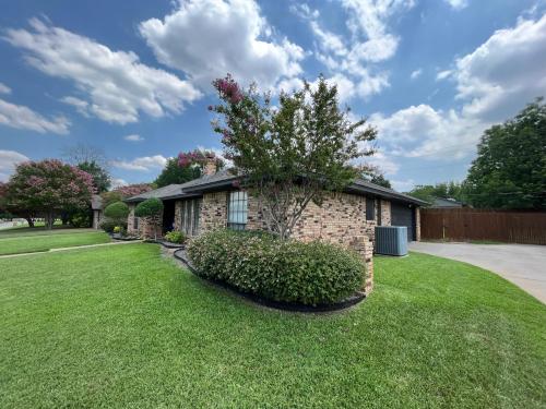 Exterior view, Highland Village, TX. Charming mid-century ranch. in Lake Dallas Exterior view, Highland Village, TX. Charming mid-century ranch. in Lake Dallas
